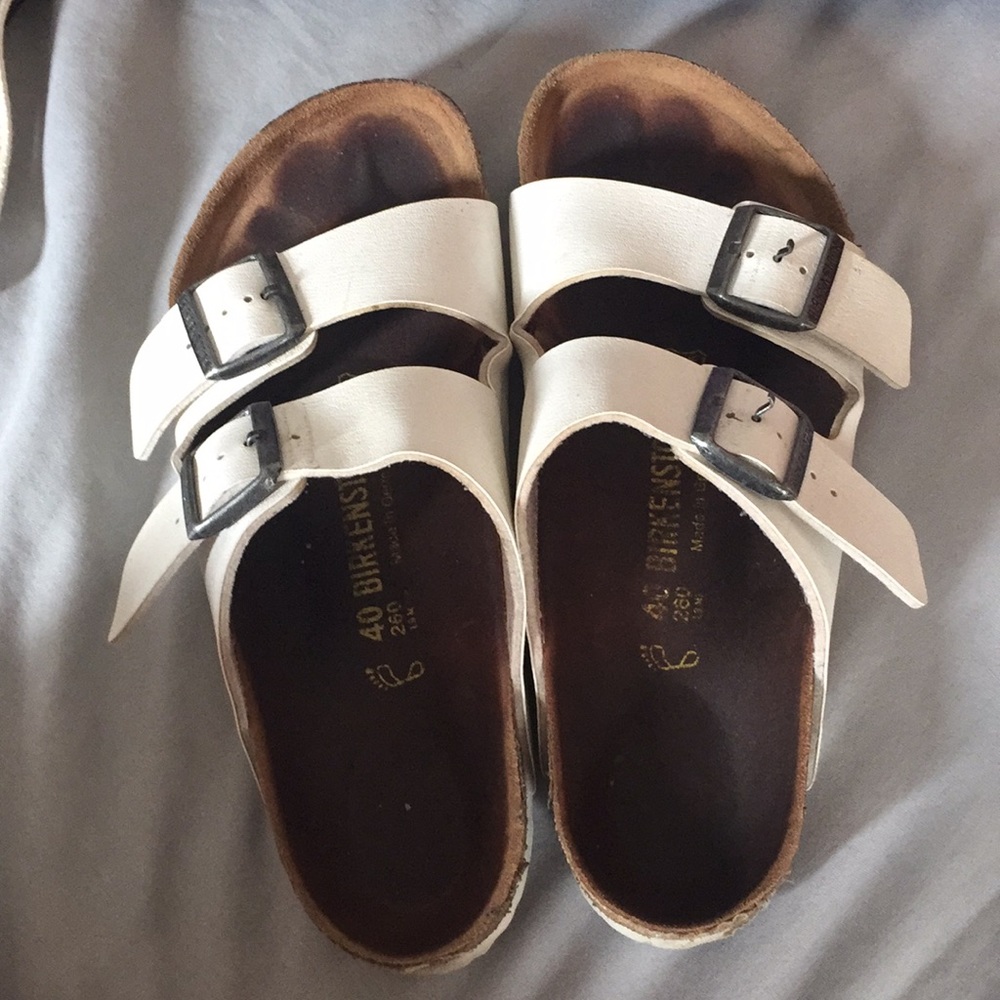 Used white Arizona Birkenstocks